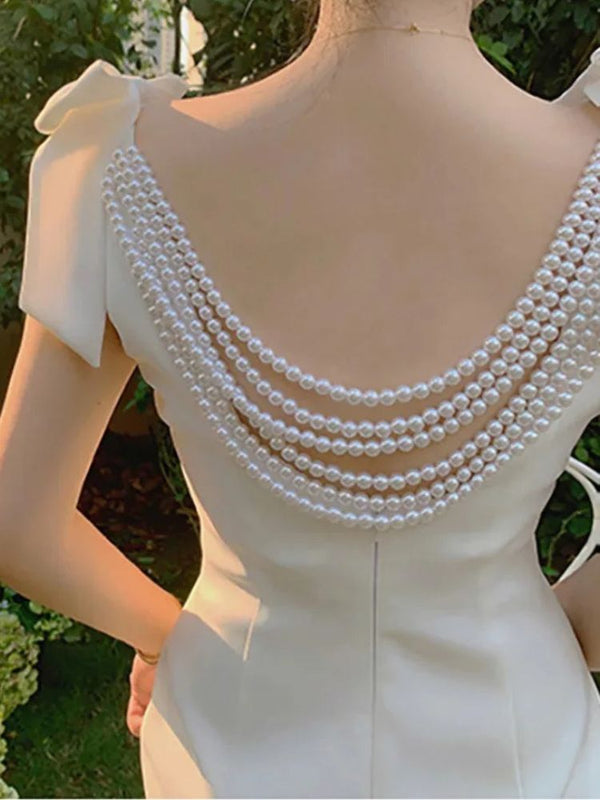 Pearl back dress